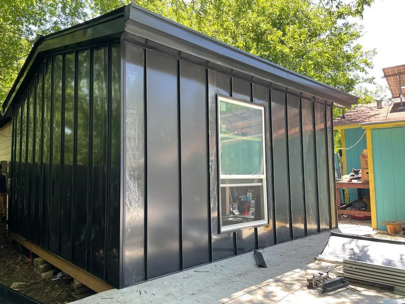 Black standing seam metal wall panels for Roof Inspection in Springfield